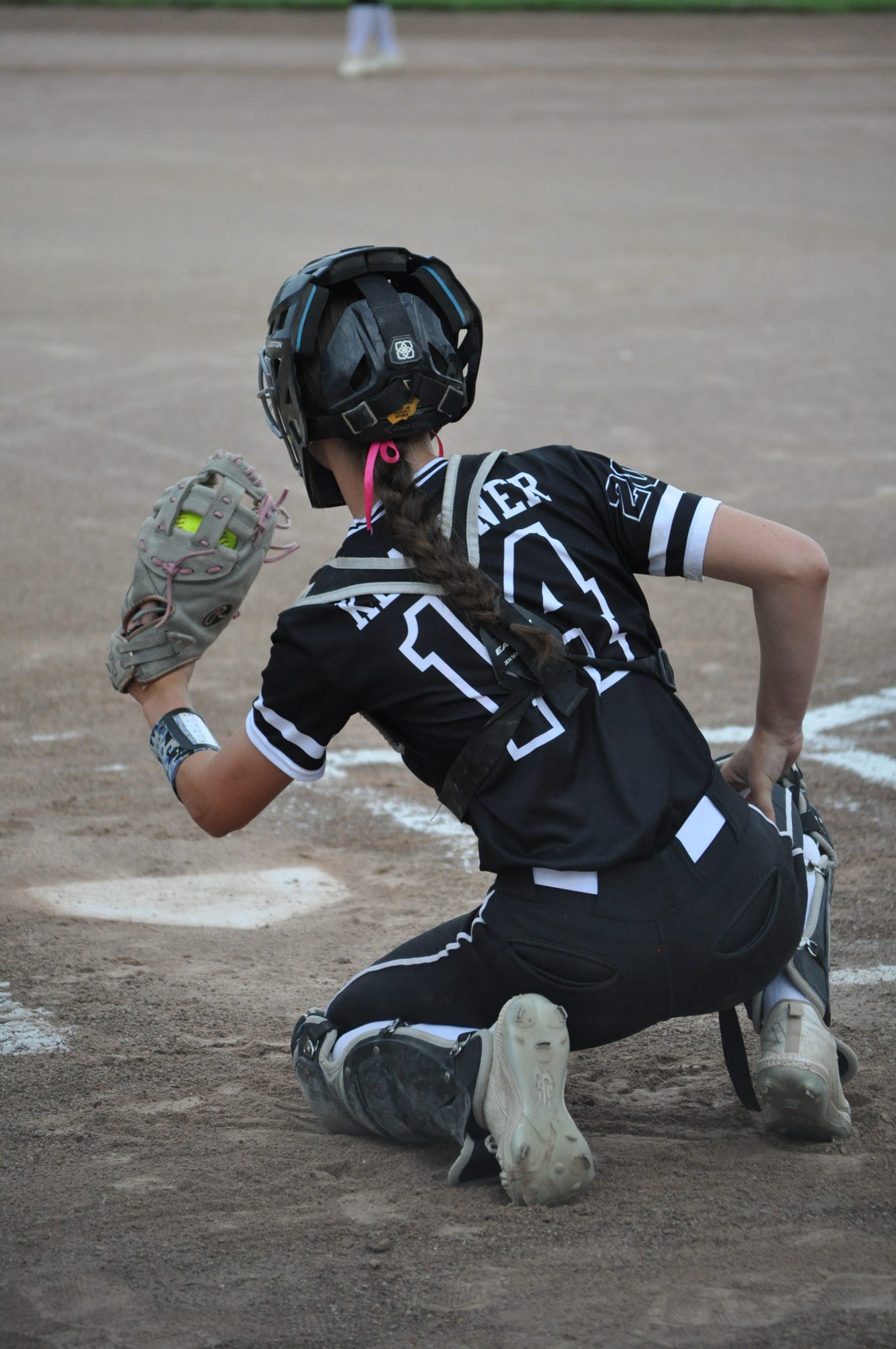 Delilah Klausner playing catcher for SOX